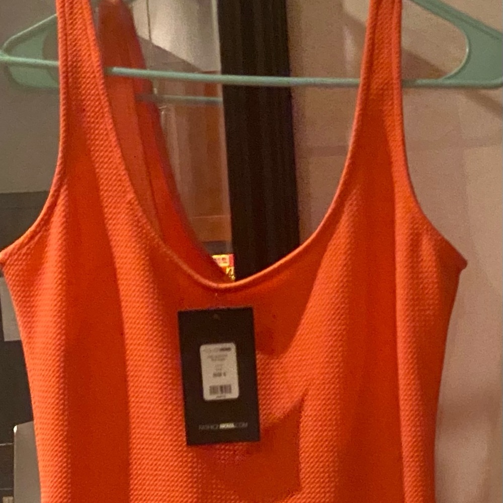 Outstanding sexy dress. Very comfy and comfortable. From Fashion Nova 4 👩🏻‍🦰